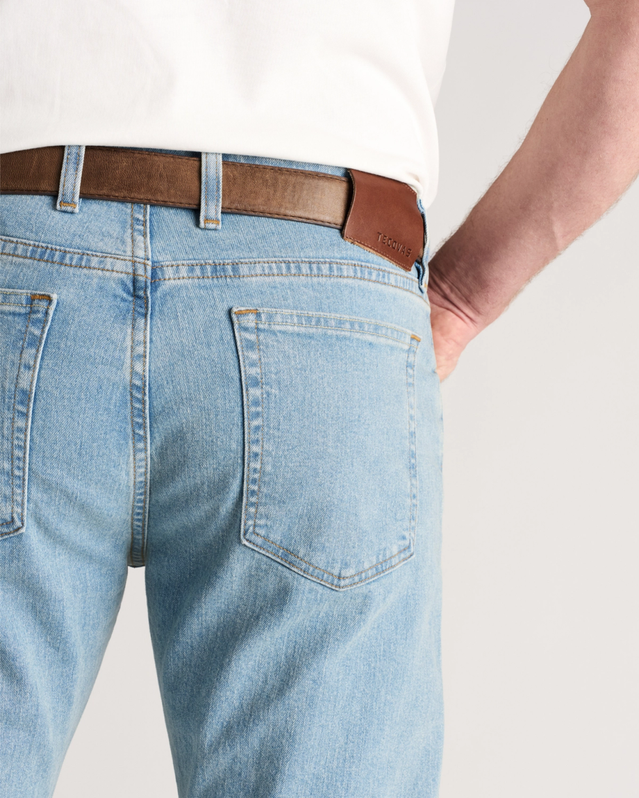 Closeup view of Men's Straight Stretch Denim - Light Stone Wash