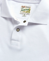 Closeup detail view of Men's Polo Pearl Snap SS - White