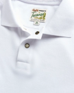 Closeup detail view of Men's Polo Pearl Snap SS - White