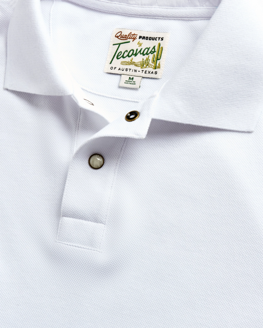 Closeup detail view of Men's Polo Pearl Snap SS - White
