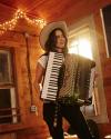 Woman in dance hall playing music