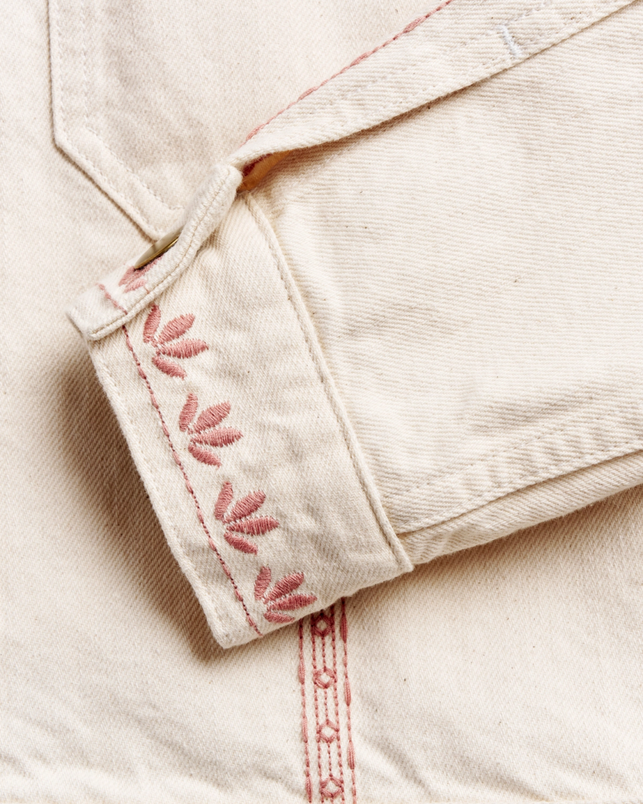 Closeup view of Women's Embroidered Mechanic's Jacket - Natural Denim