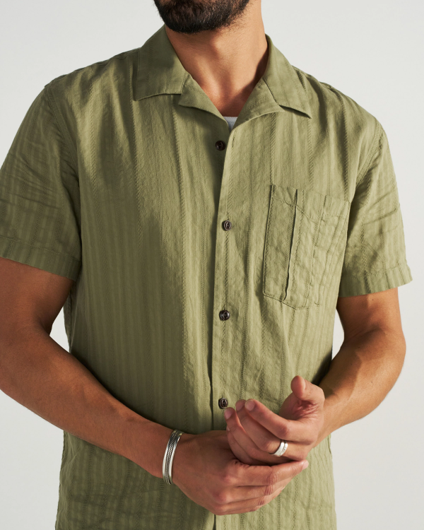 Front view of Men's Dobby Camp Shirt - Sage on model