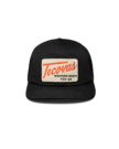 Front view of Tecovas Patch Flat Brim 6 Panel Trucker - Black on plain background