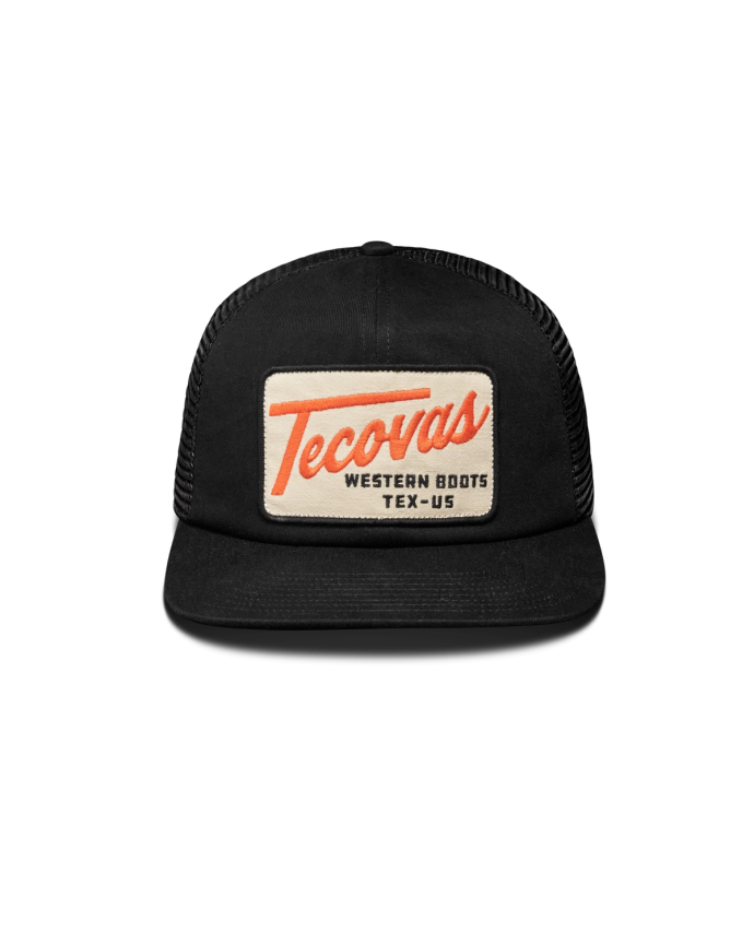 Front view of Tecovas Patch Flat Brim 6 Panel Trucker - Black on plain background
