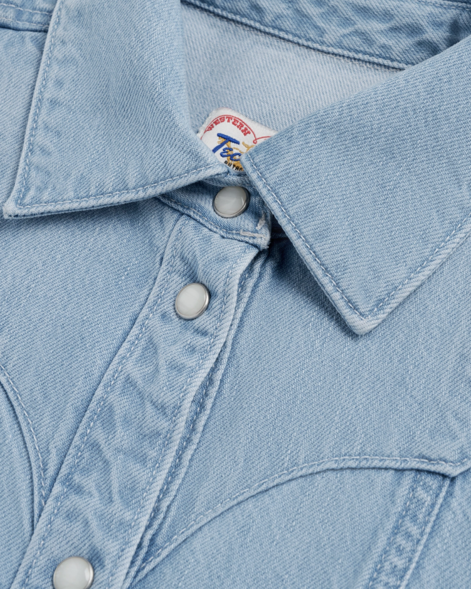 Closeup detail view of Women's Short Sleeve Mini Pearl Snap Dress - Light Wash