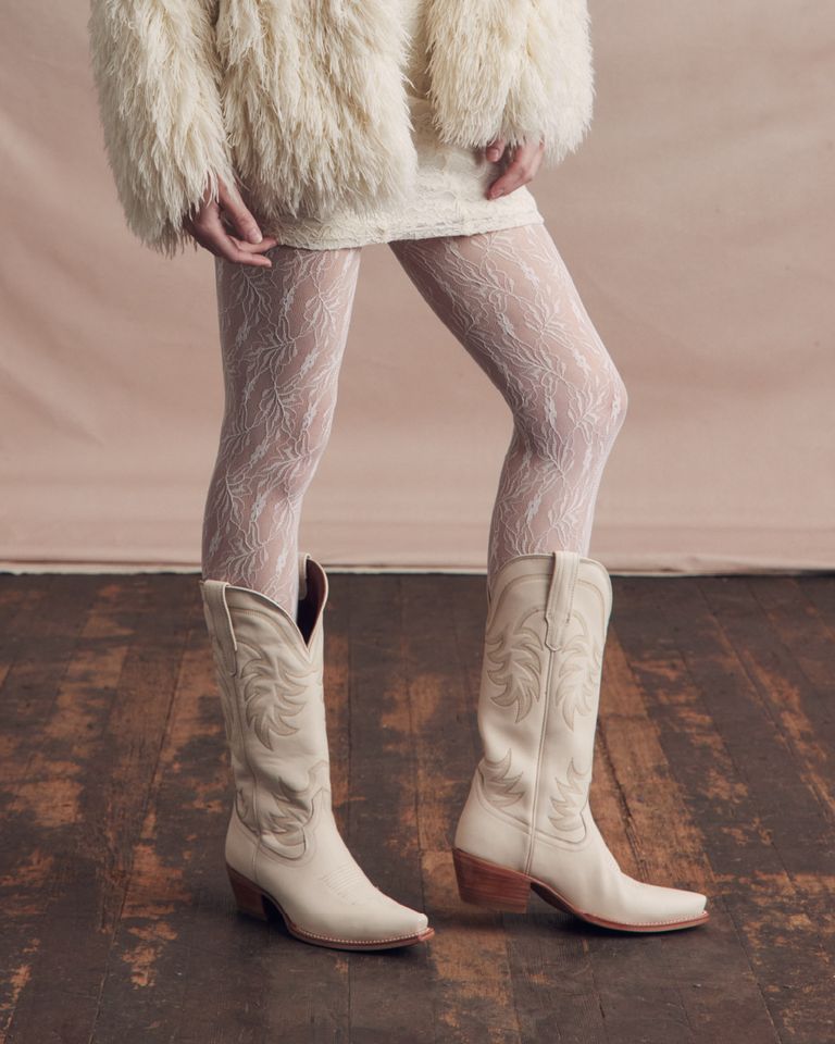 Cowboy boots, wooden floor, white tights, white boots