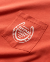 Closeup detail view of Men's Horseshoe Pocket Tee - Orange / Bone