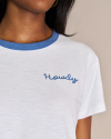 Closeup view of the Women's Vintage Ringer Tee Howdy embroidery