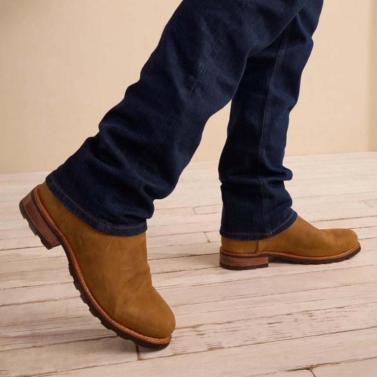man in boots with rubber sole