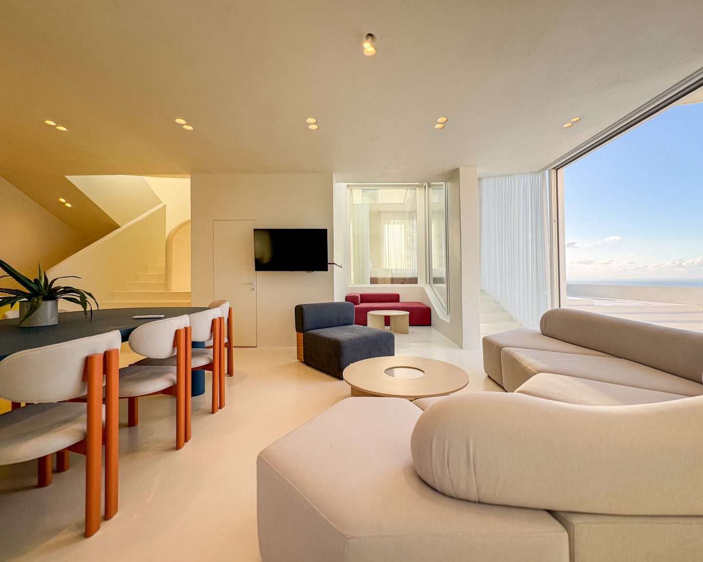 Open living space of Escape Villa II with panoramic landscape views