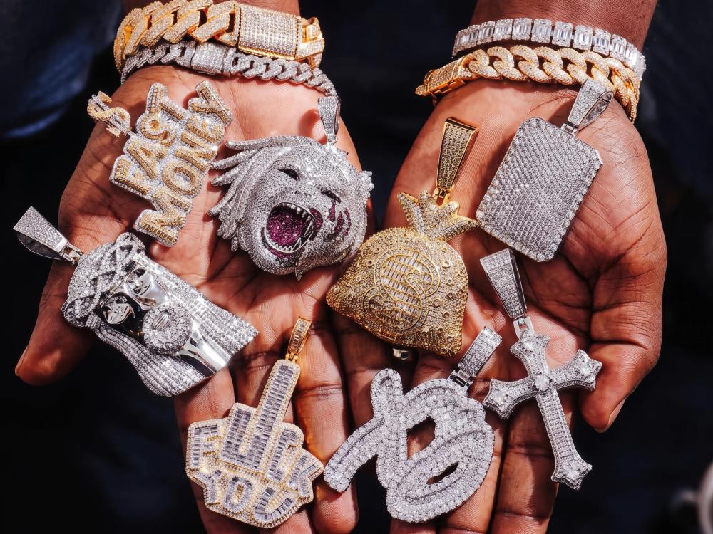 Assorted custom hip hop pendants in iced-out statement designs