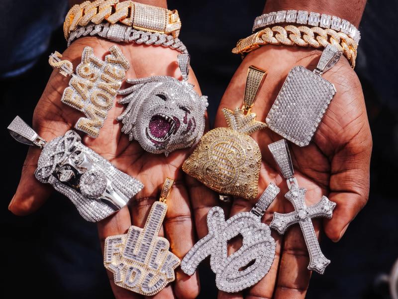 Assorted custom hip hop pendants in iced-out statement designs