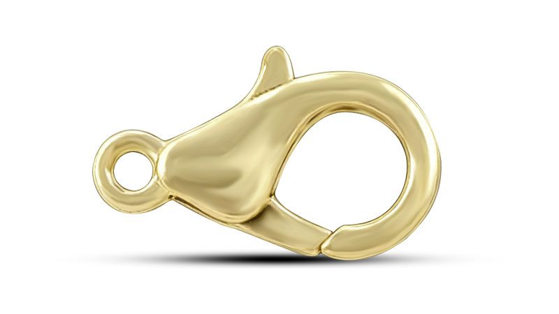 A gold lobster clasp for jewelry.