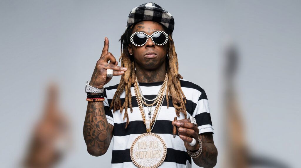 Lil Wayne’s jewelry style is widely recognized for its maximalist approach, characterized by heavy