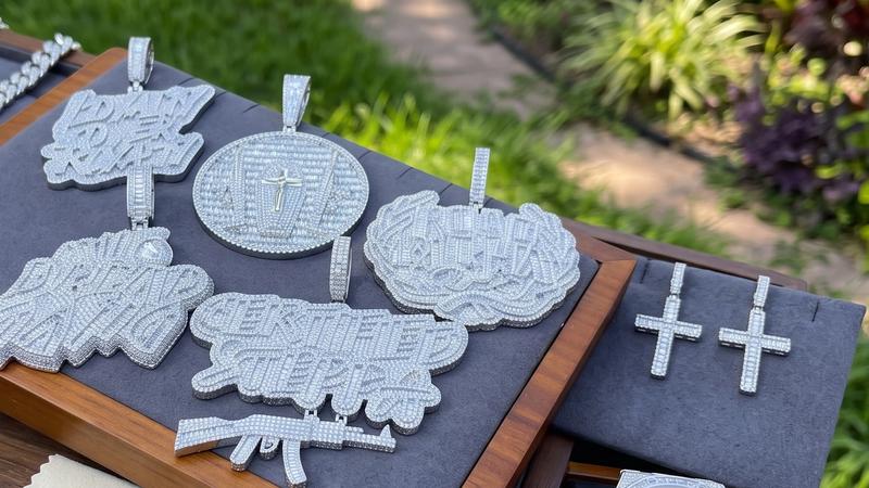 Custom iced-out hip hop pendants with pavé stone setting