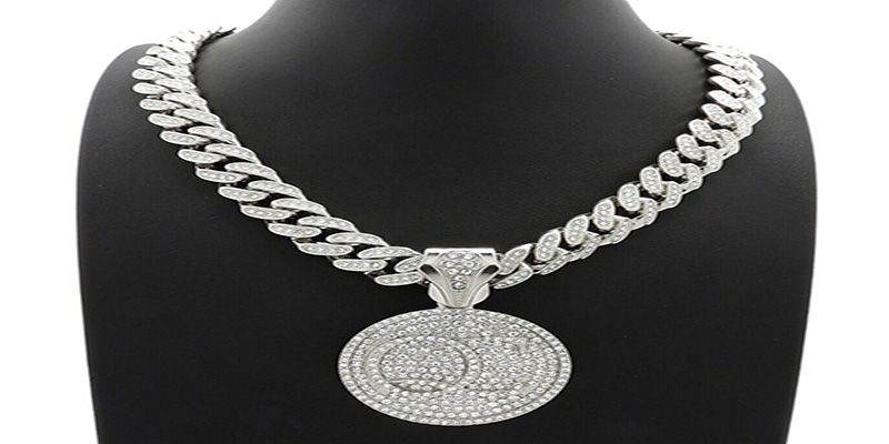 It is actually a circle pendant with a thick chain, especially customized for streetwear and modern cultures.
