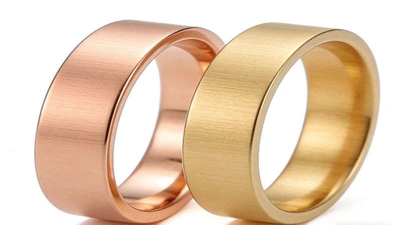 Real rose gold is a firm blend of copper and gold, while rose gold-plated gems comprise just a layer of rose gold over a base metal.