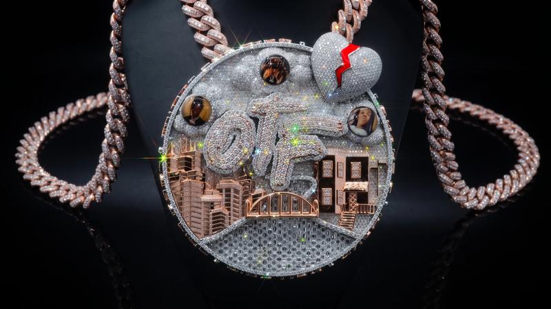 Large statement hip hop pendant with oversized iced-out design