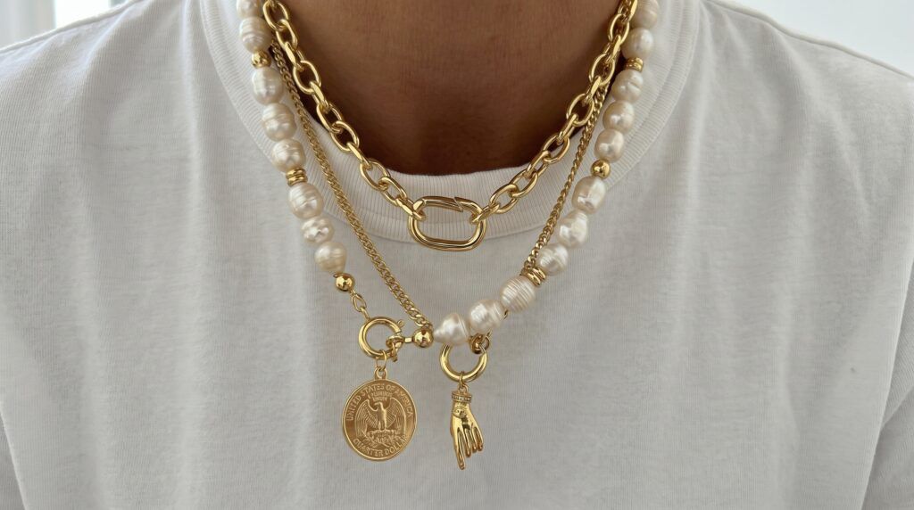 A blend of gold, silver, and other finishes across necklaces, pendants, and bracelets.