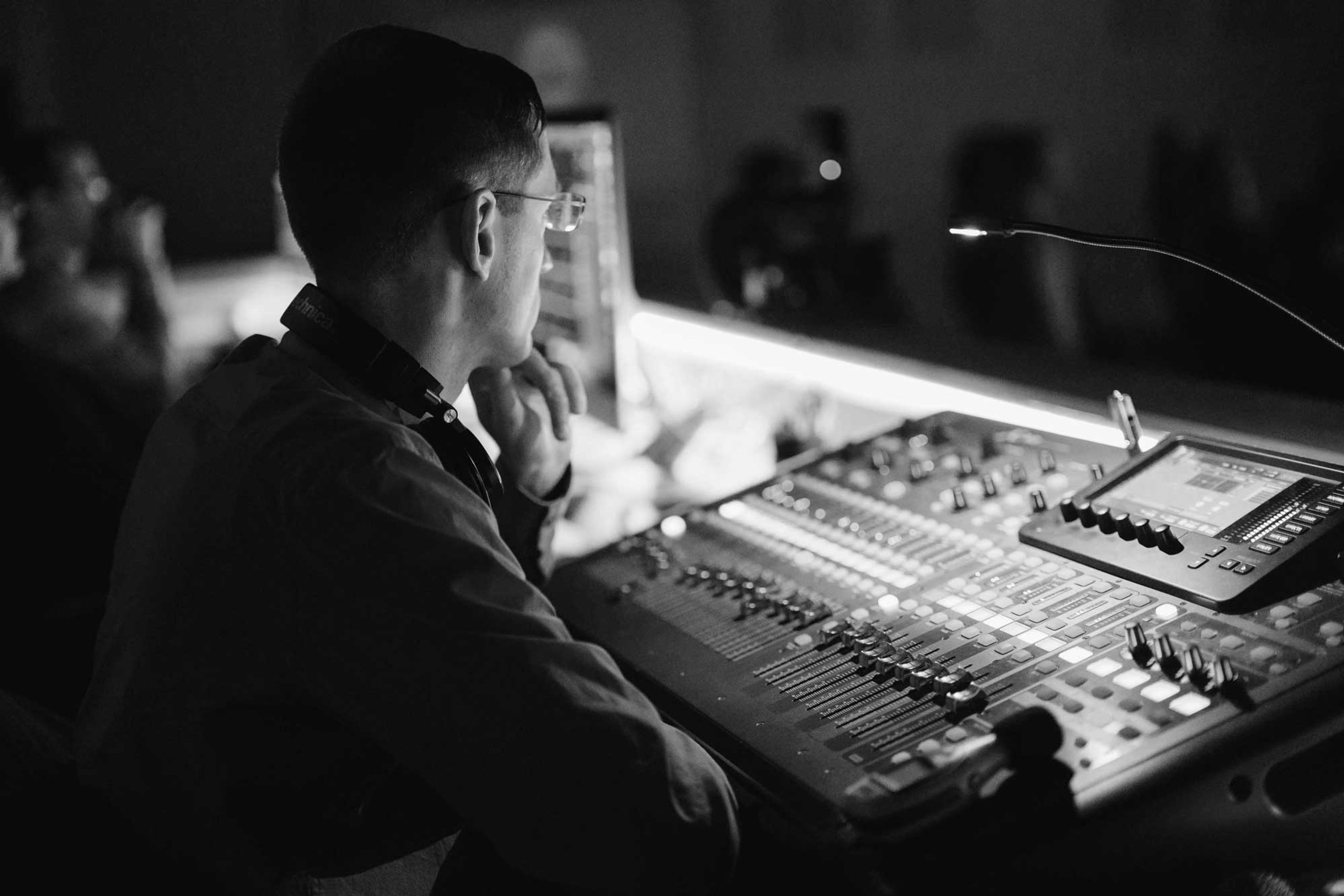 A sound engineer at a mixing console