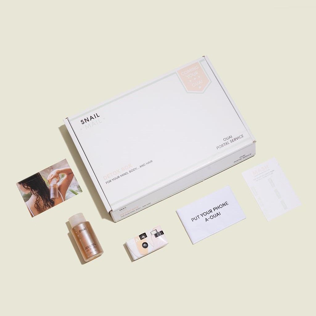 Custom packaging with hair products and printed post card 