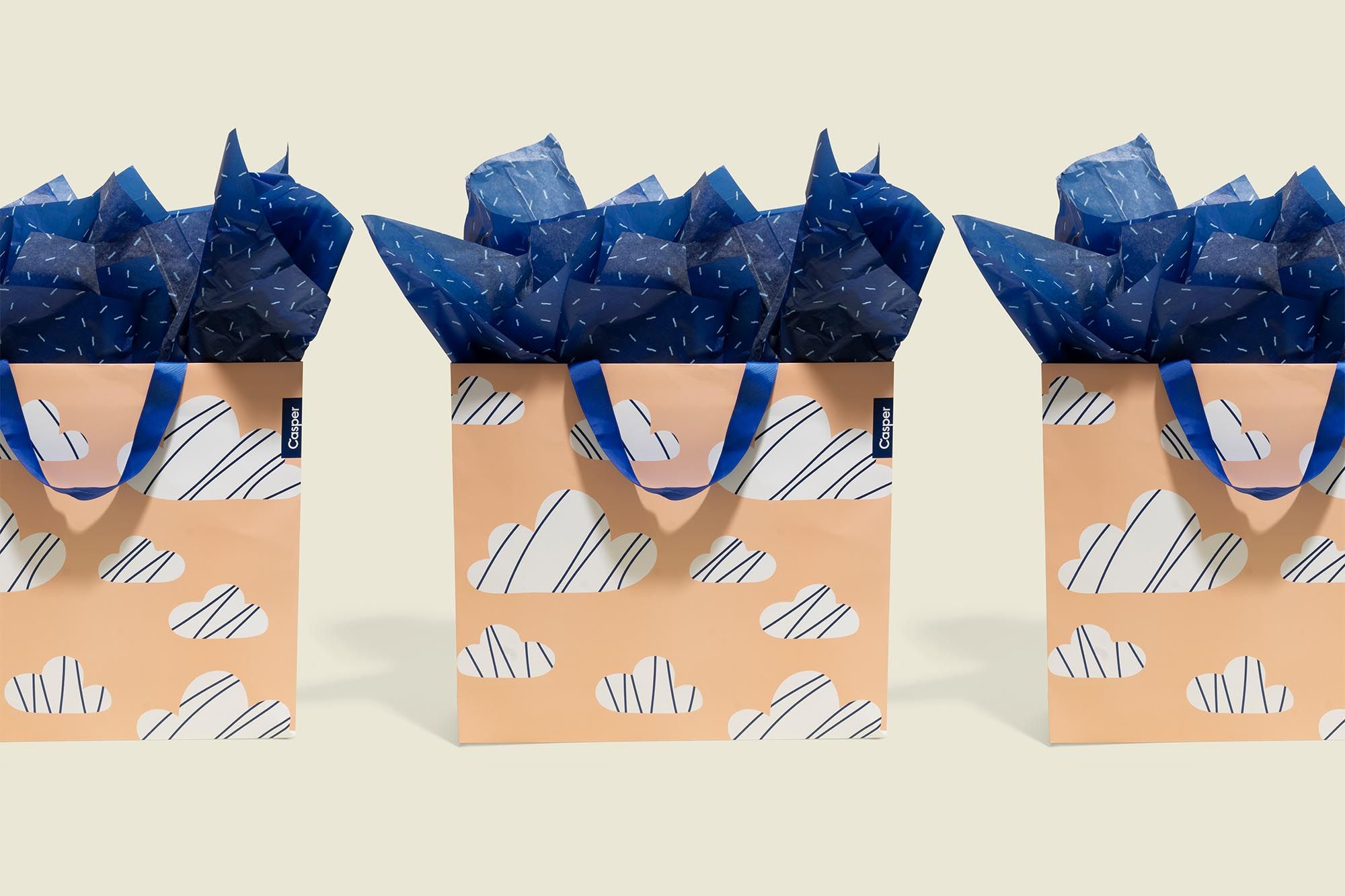 Three Gift bags with tissue paper 
