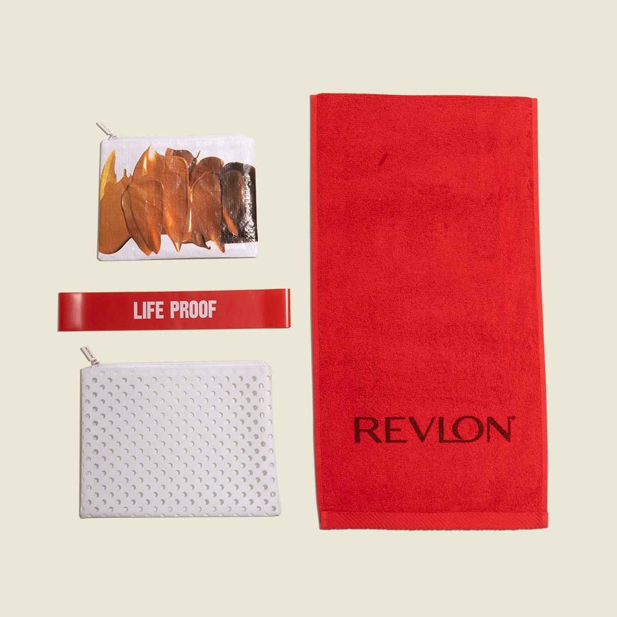 Flat zip pouches with towel and red exercise bands 