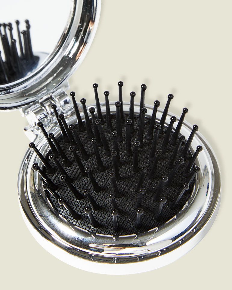 Compact mirror with hair brush 