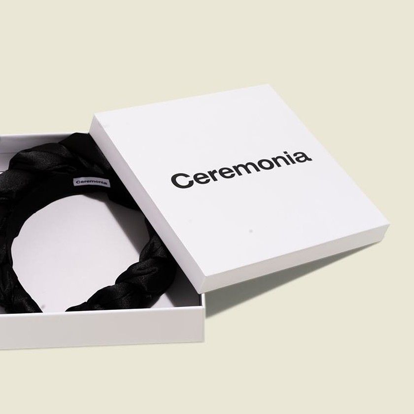 Custom packaging with braided black satin headband 