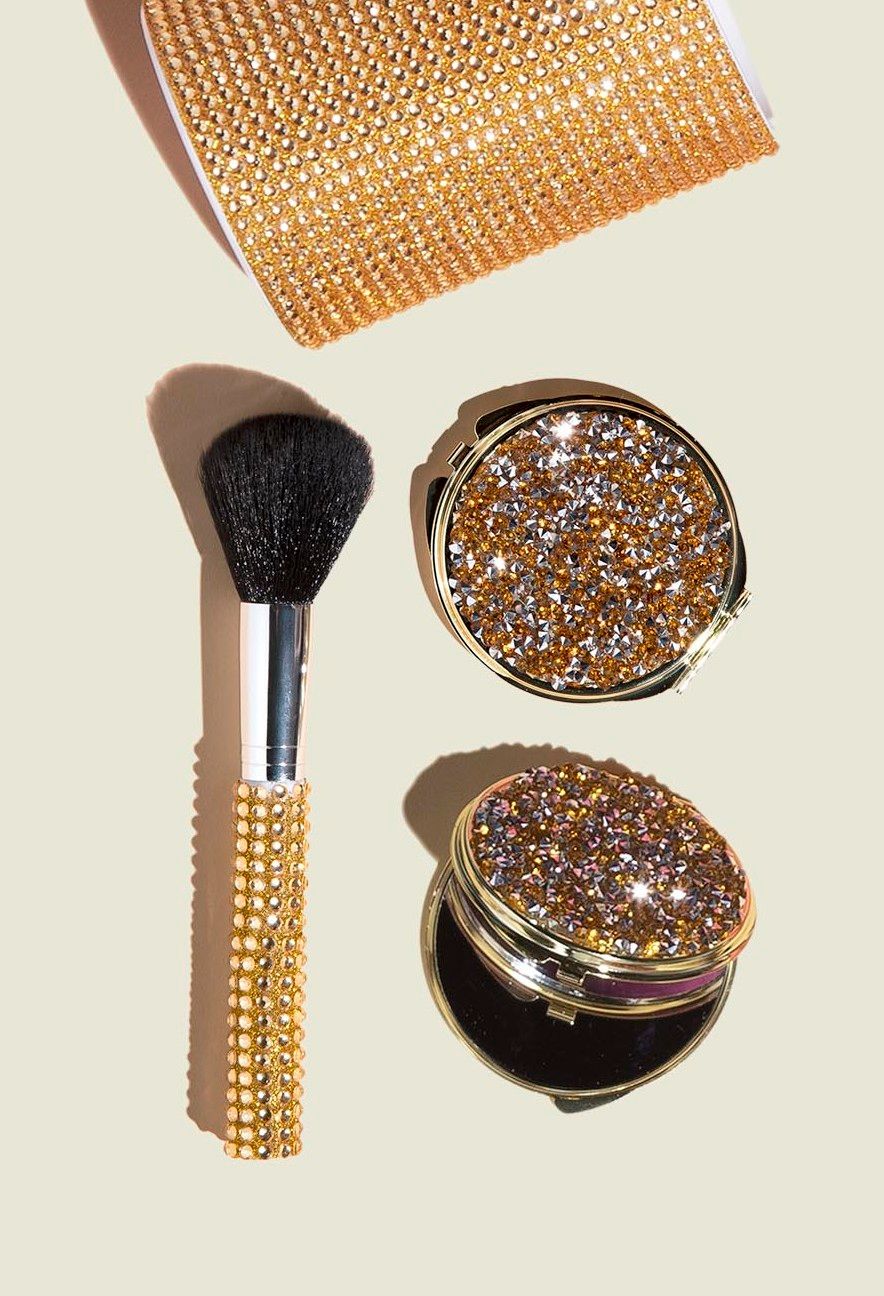 Makeup brush with compact mirrors 