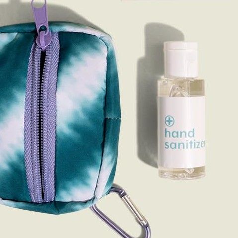 Standing zip pouch with hand sanitizer 