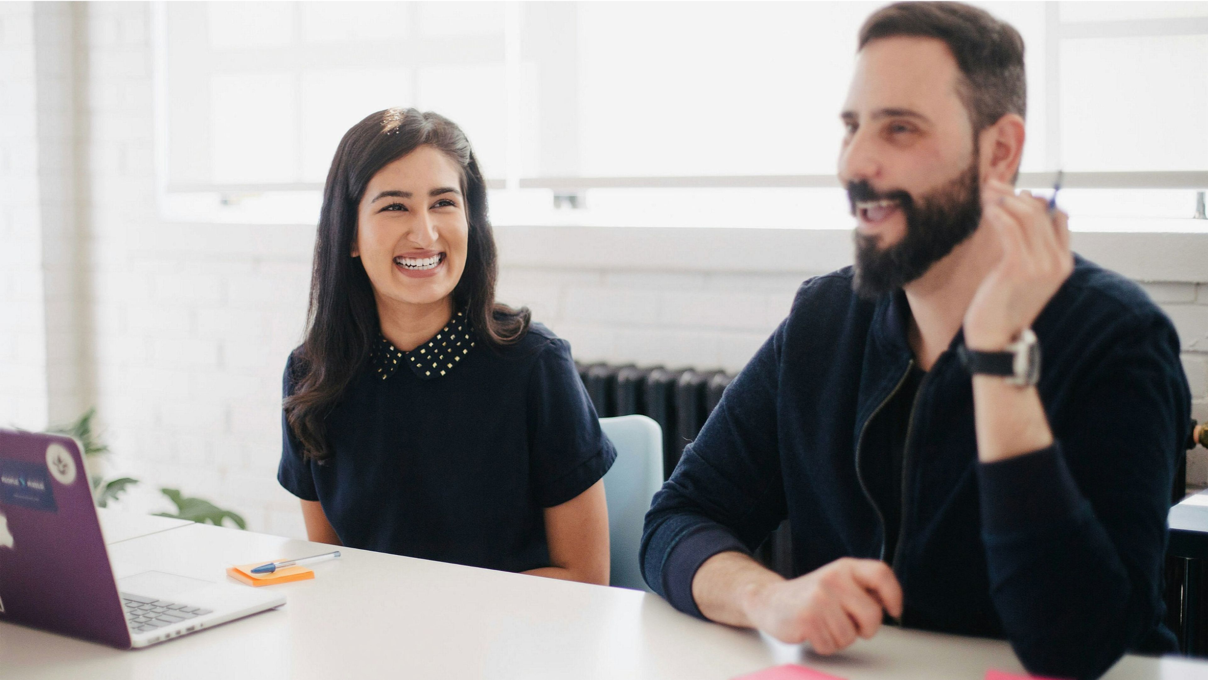 Colleagues laughing