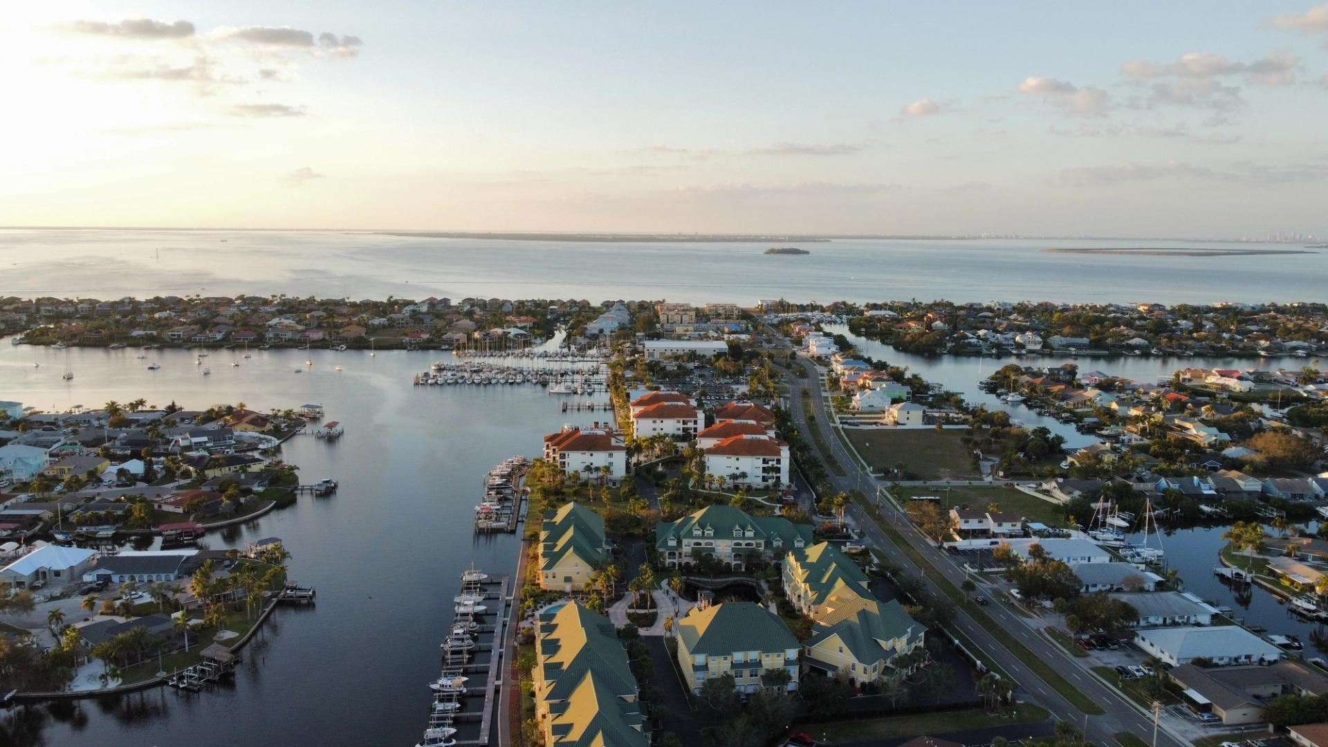 Aerial view of a Florida coastal residential community with waterfront homes and beaches.