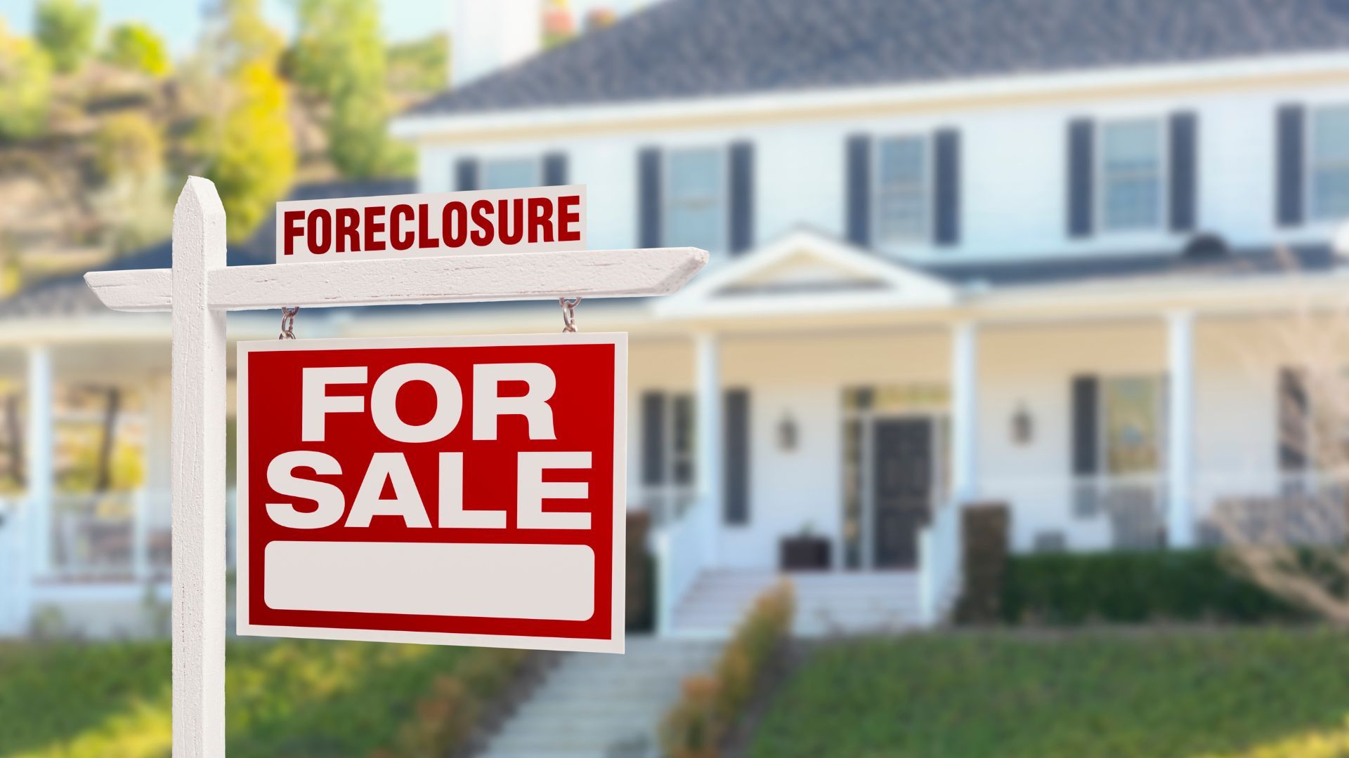 sell house in foreclosure sign in front of home