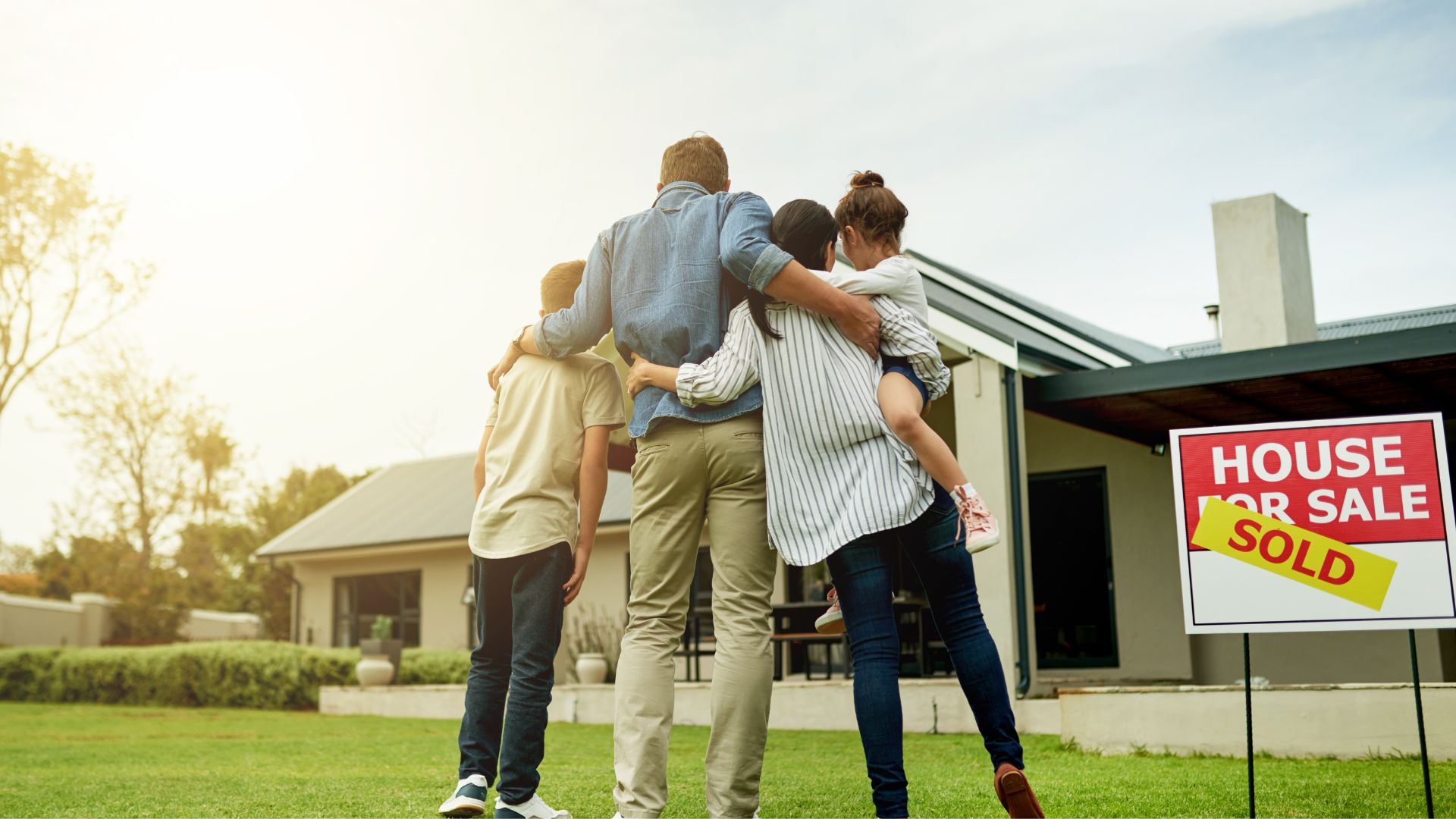 Family after successfully selling their home in 2026 housing market.