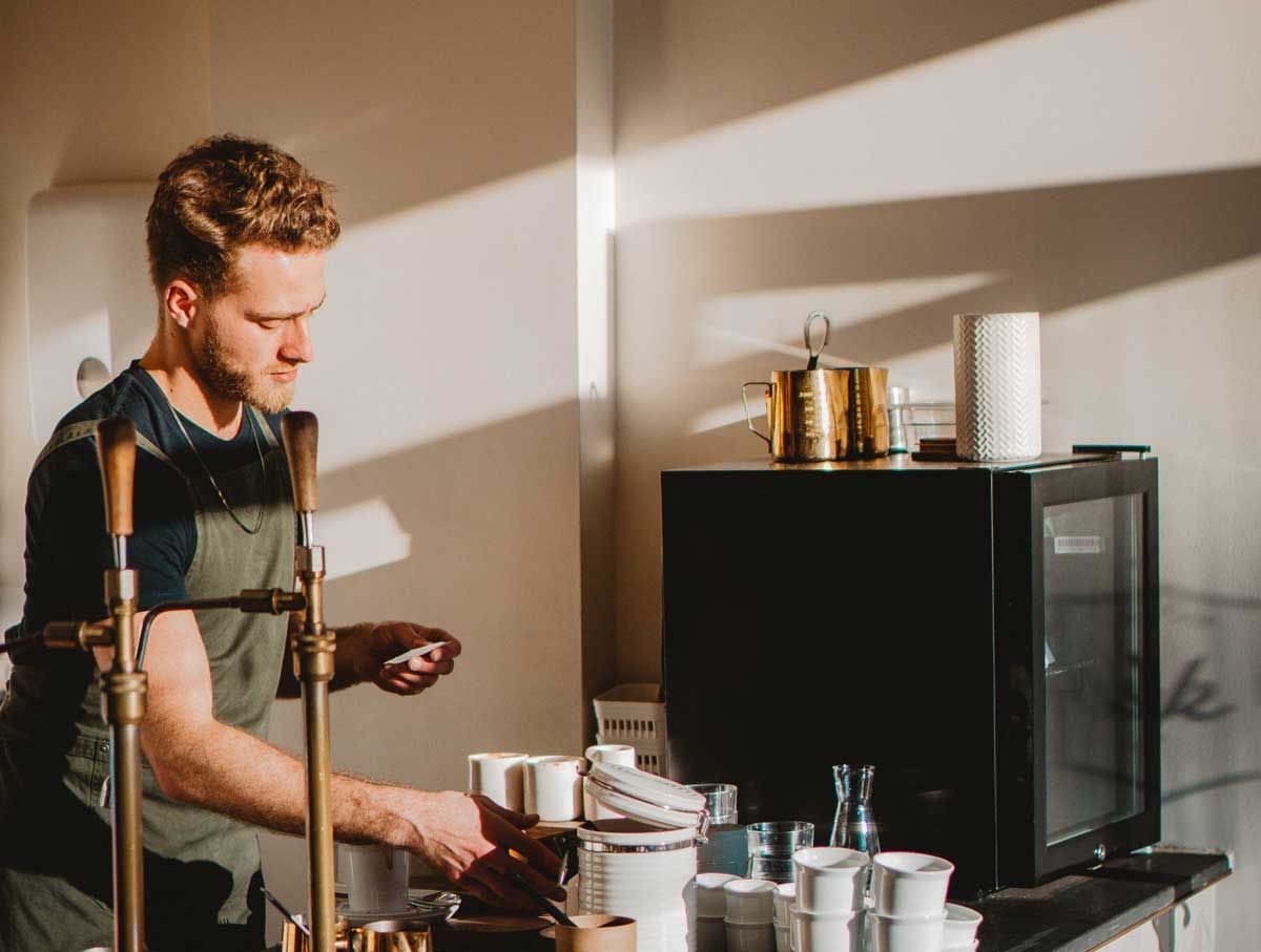 Man working in coffee shop 