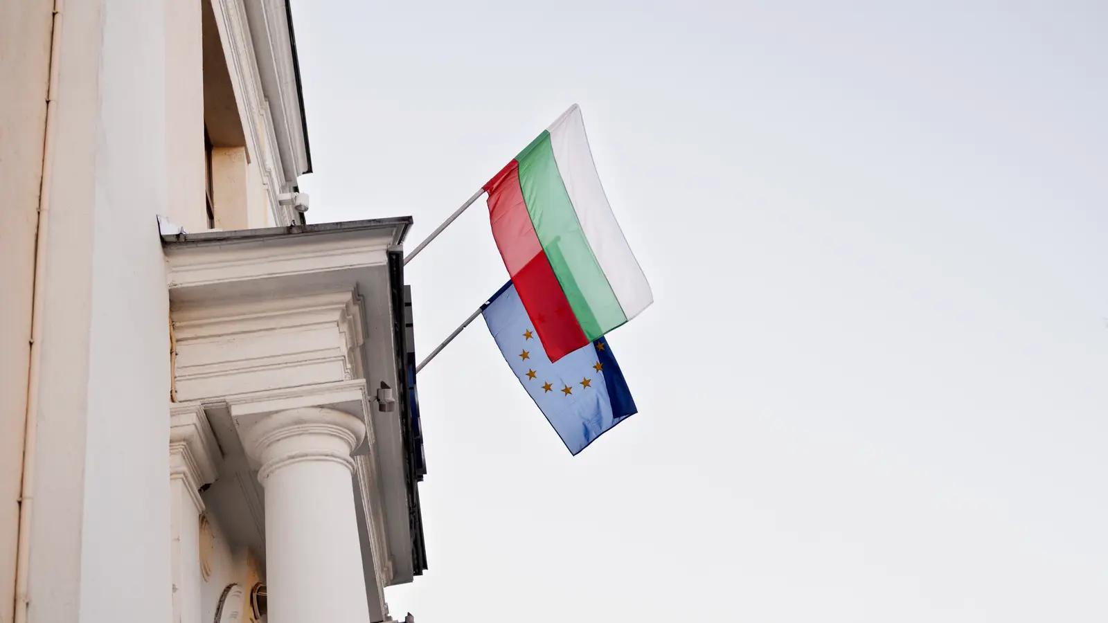 The flags of Bulgaria and the European Union on a building facade