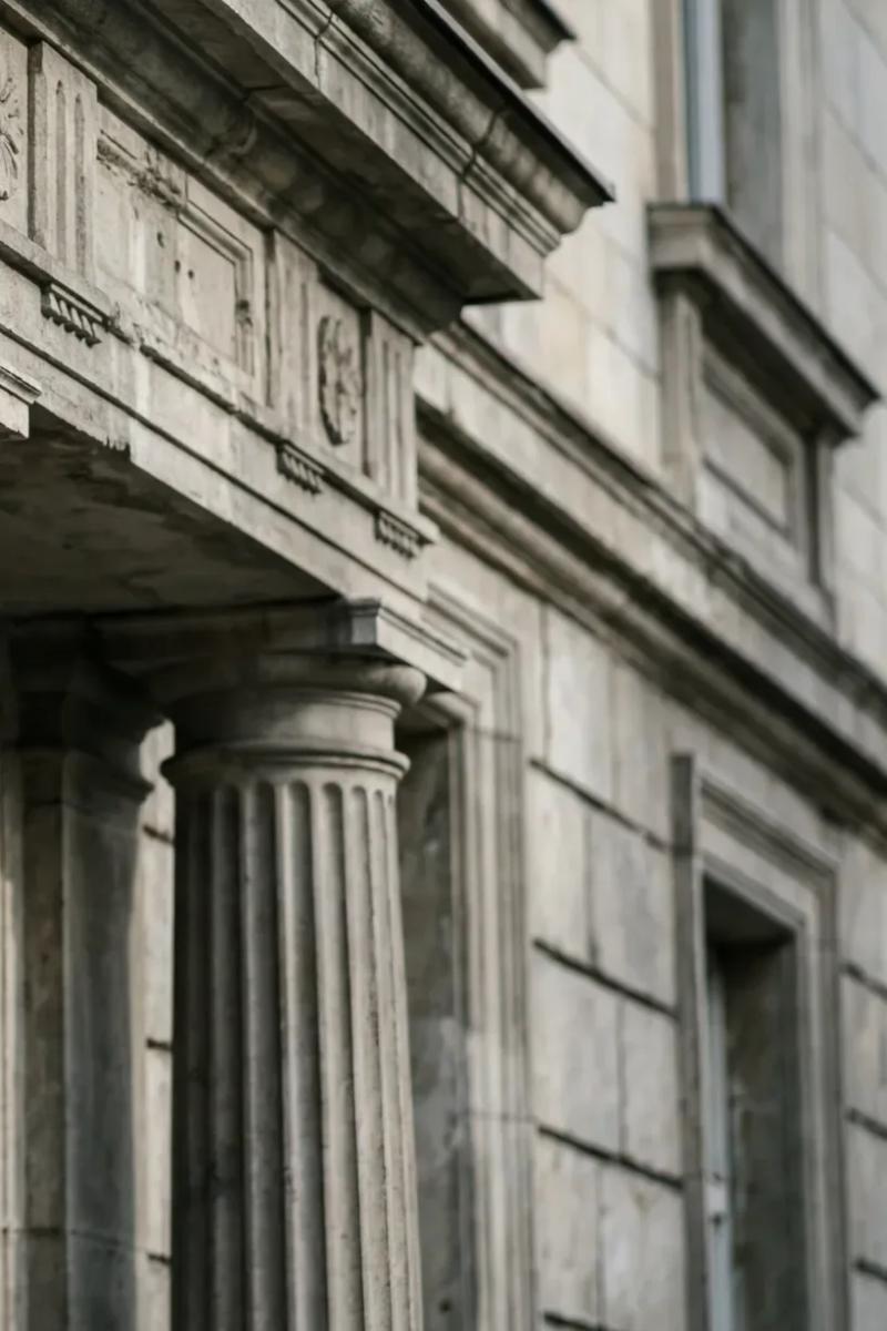 A carved column capital on a neoclassical facade, Sofia