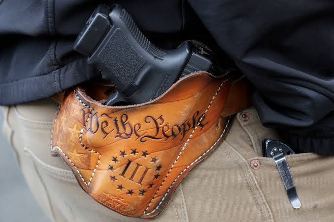 Trump Pardoned Them. The FBI Still Won’t Let Them Buy a Gun.