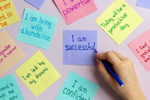 coloured post-it notes with inspiring messages