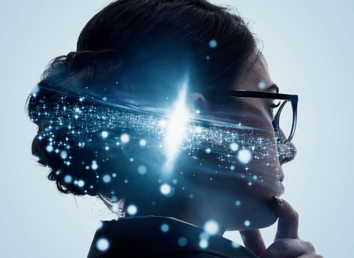 woman thinking, possibly about technology