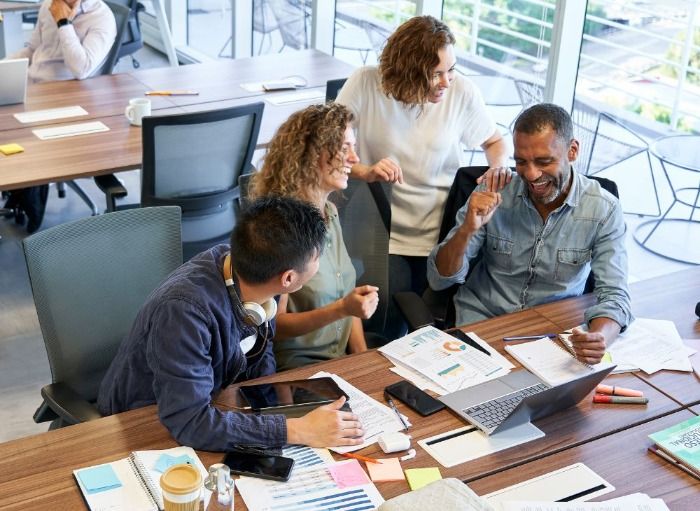 group of people collaborating over a joint work project