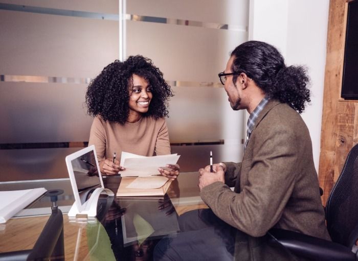 woman and man participating in a job interview