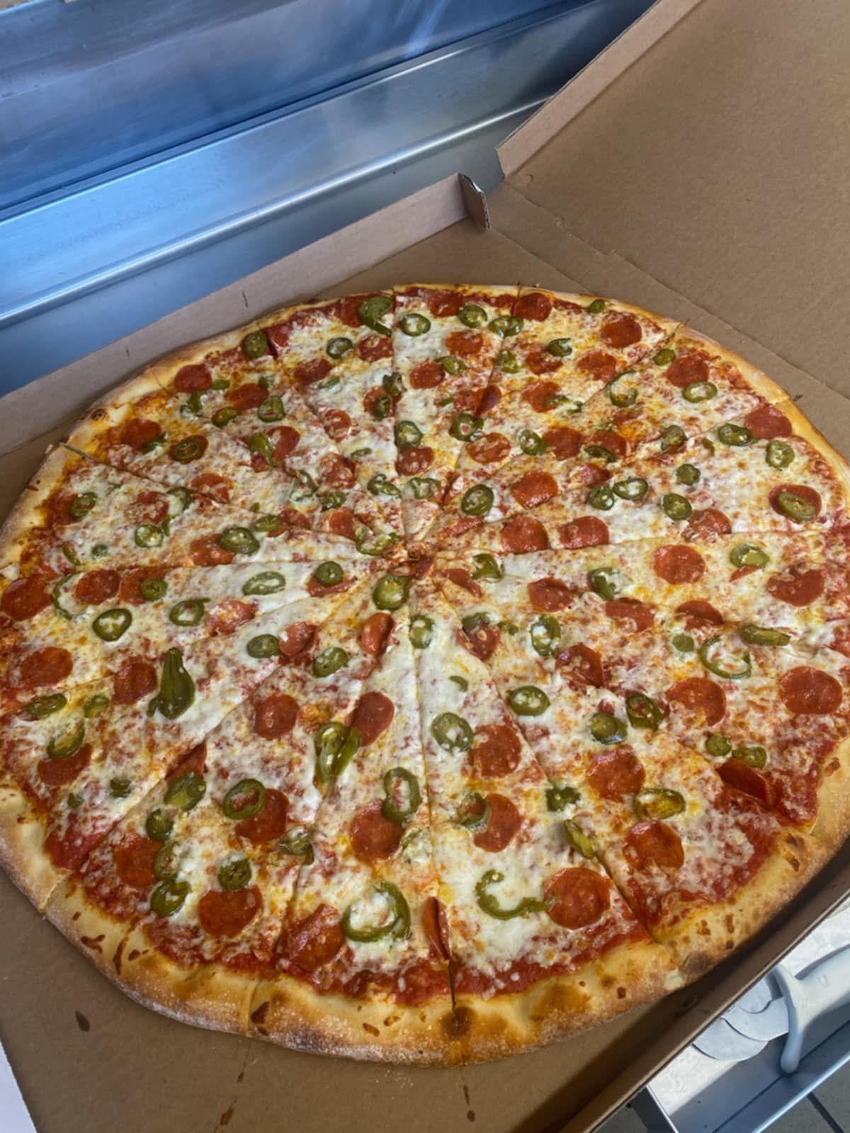 peperoni and green bell pepper pizza