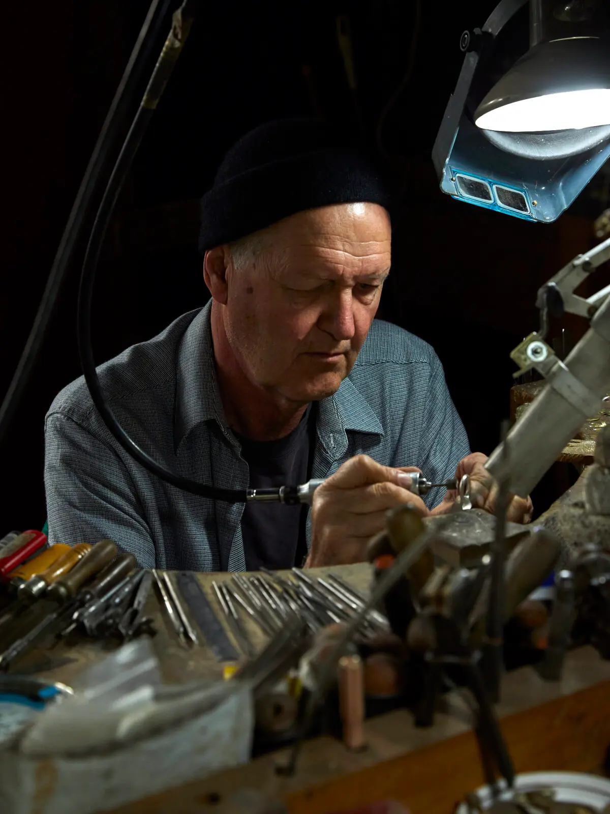 Artist working on brooches
