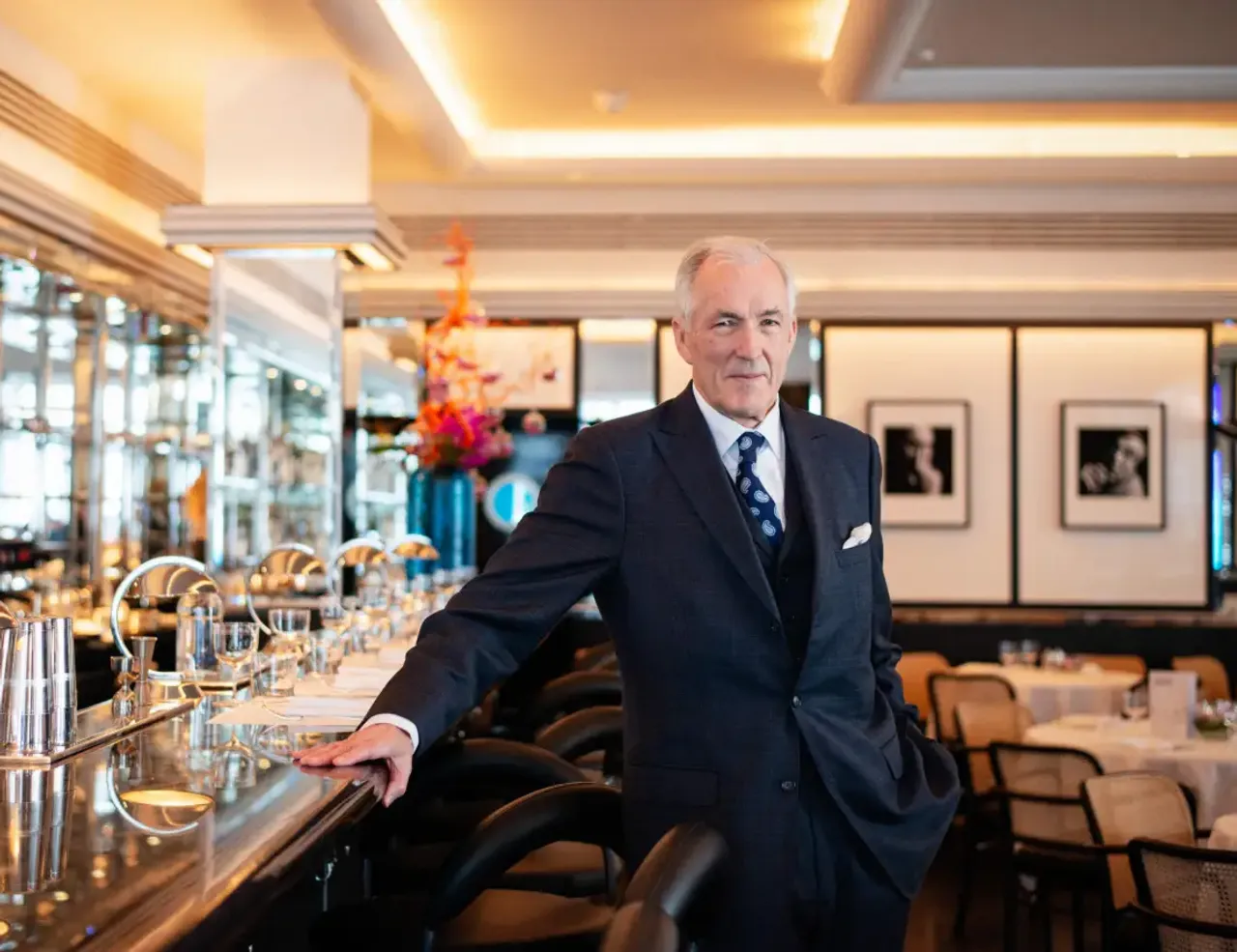 Jeremy King leaning on bar in Arlington