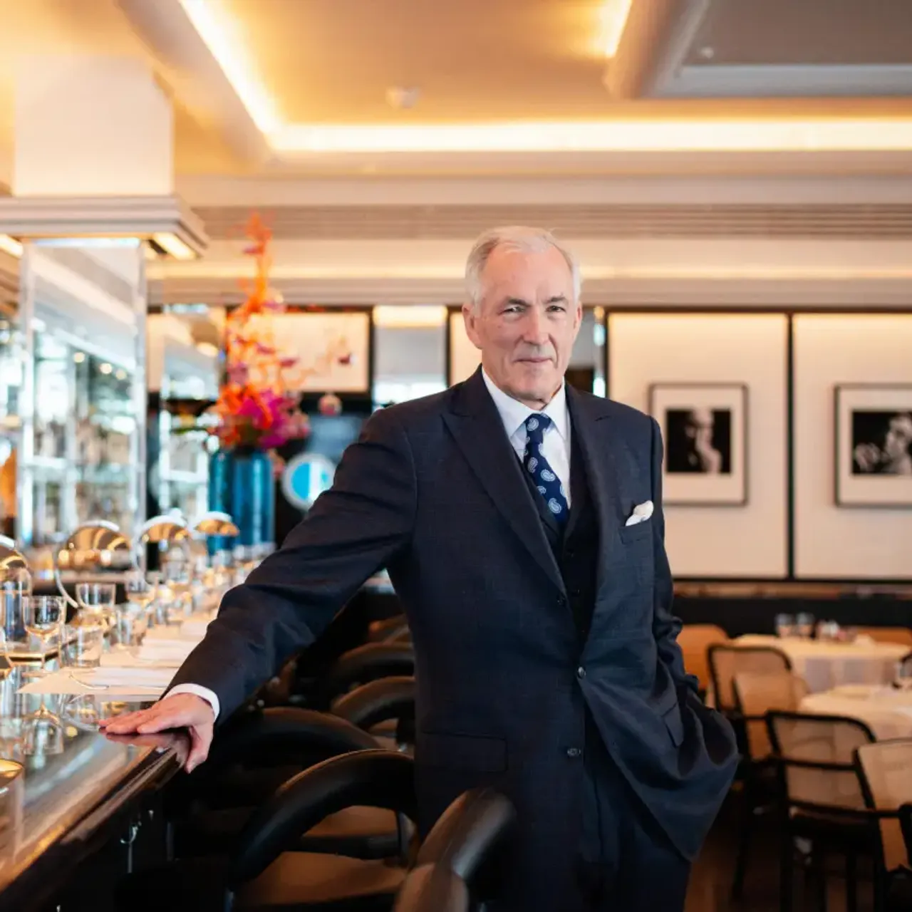 Jeremy King leaning on bar in Arlington