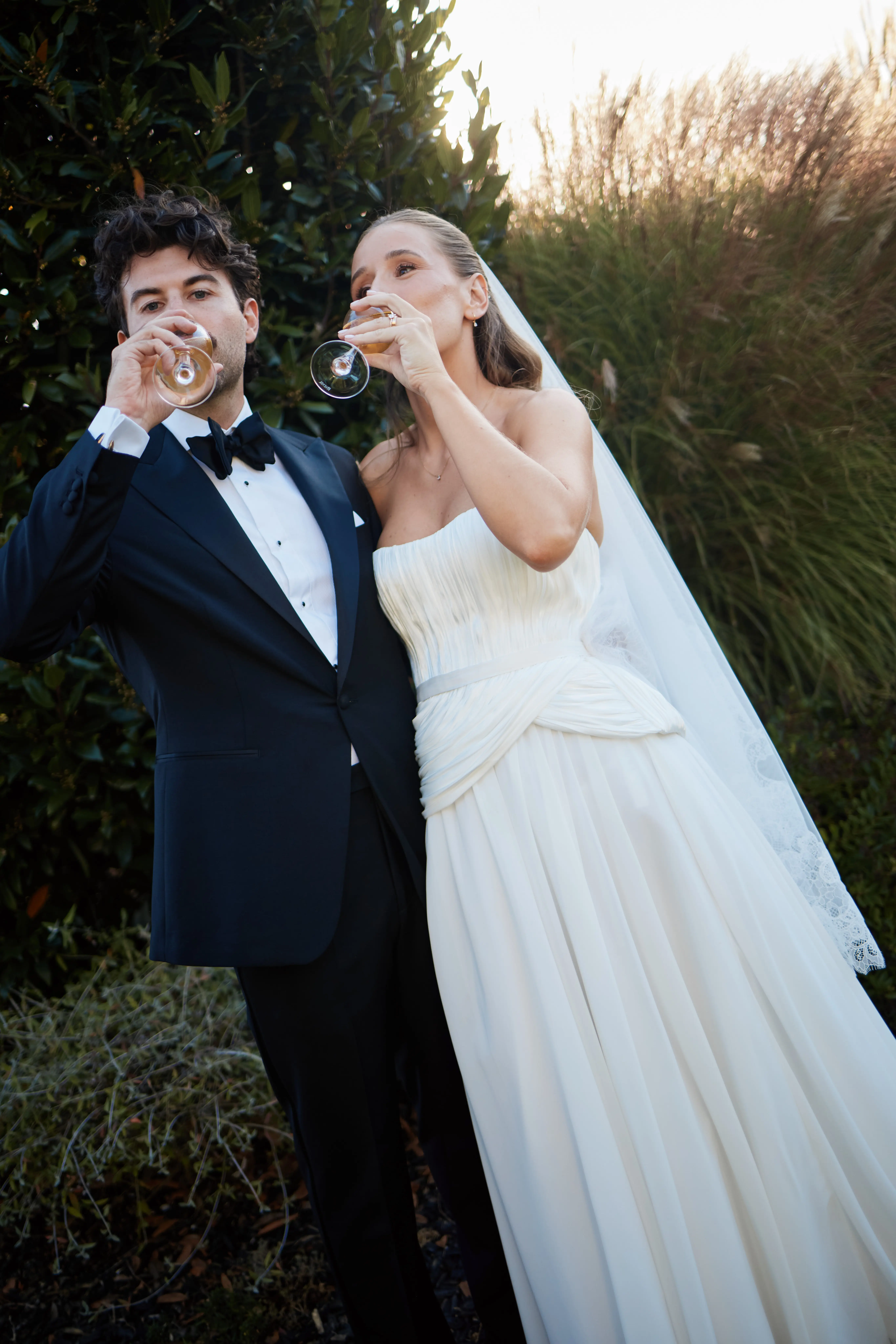 Bride and Groom drinking champagne