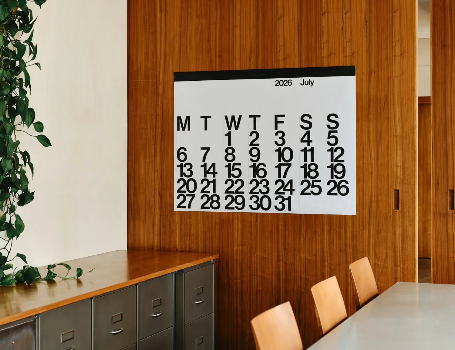 Large monochrome Stendig calendar on wall